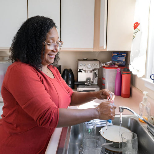 Woman washing dishes