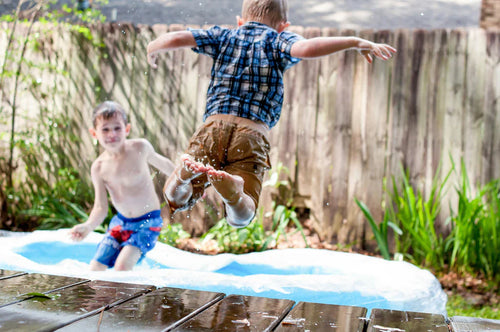 Boys Playing In Water