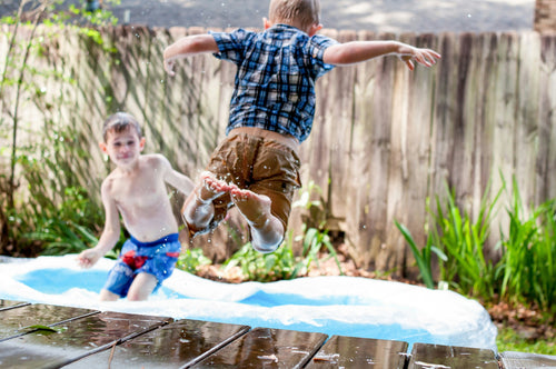 Boys Playing In Water