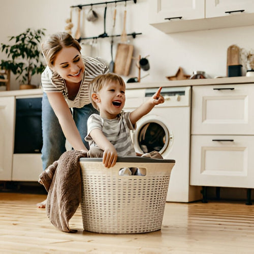 Mom and son in laundry basket