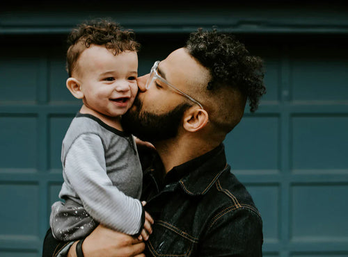 Father Kissing Son