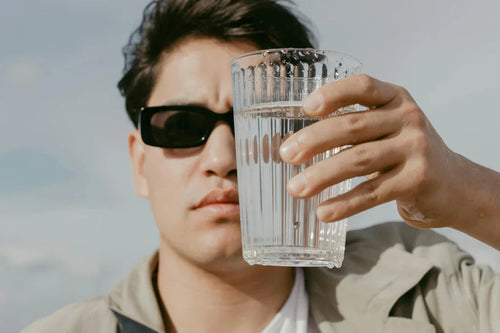 A boy Holding Glass of Water