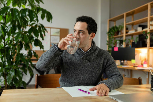 Man Drinking Water