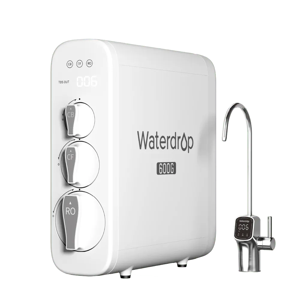 White rectangular Waterdrop 600G plastic water filter with three round dials and a metal faucet on a black background.