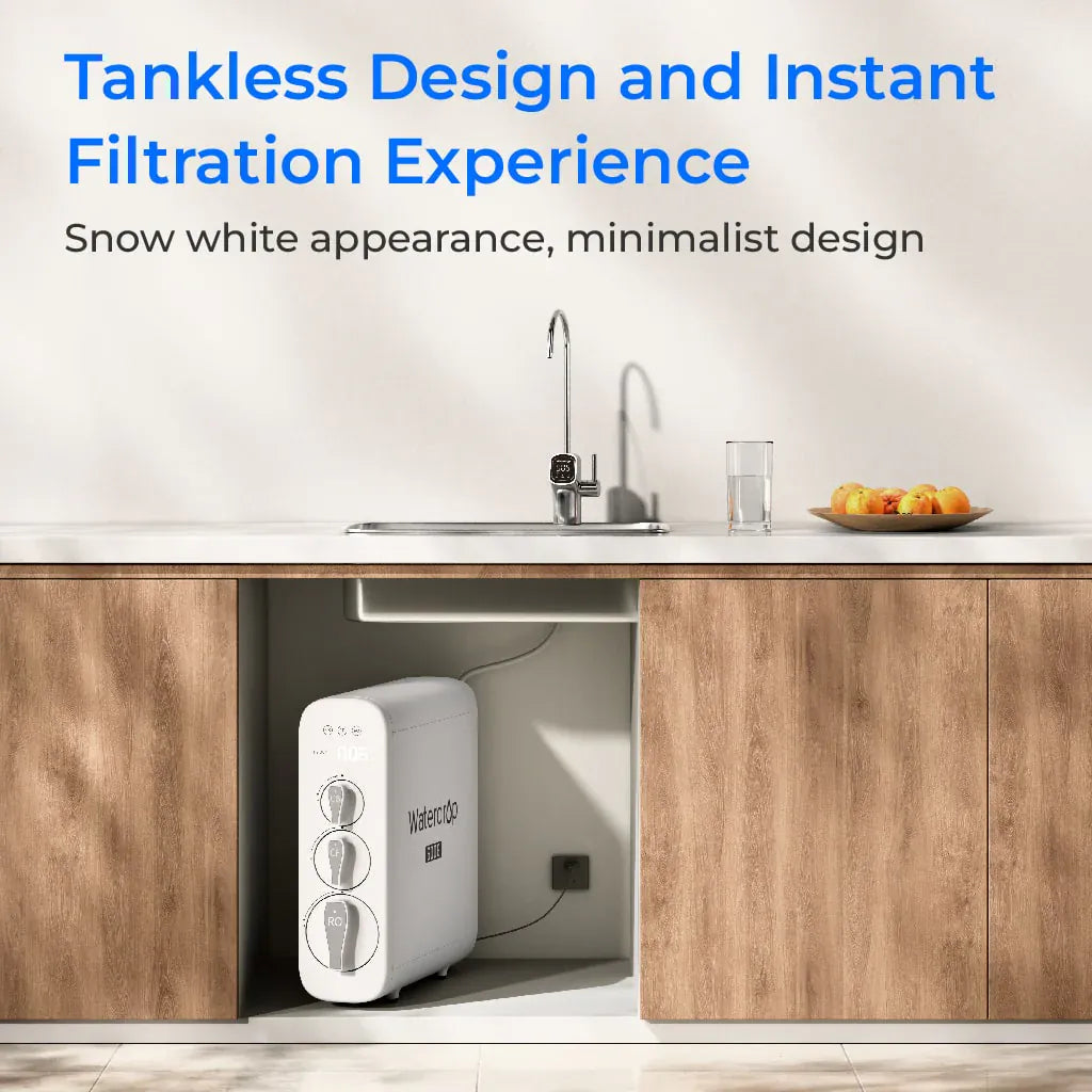 White rectangular Waterdrop G3P600 filtration unit installed under a wooden kitchen cabinet next to a sink and faucet.